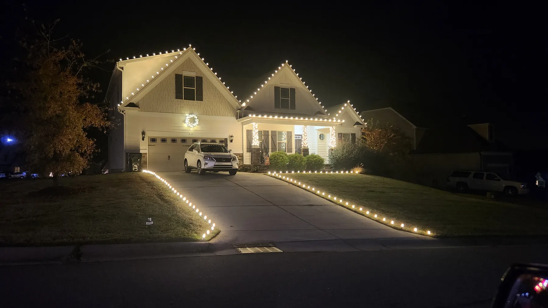 Roofline and driveway lighting in Johnston County.