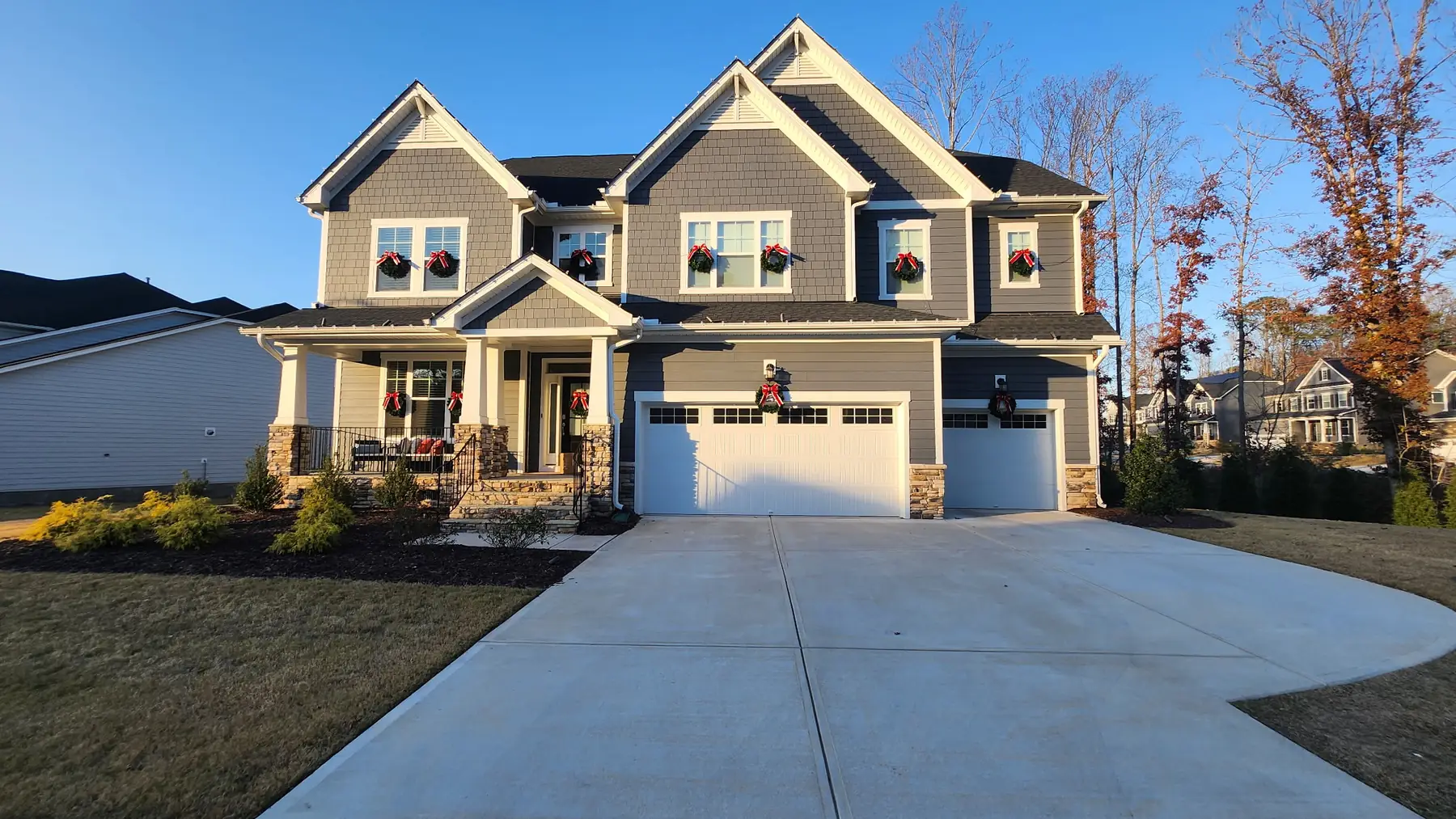 Christmas light installation in The Mills at Avent Ferry, Holly Springs, NC